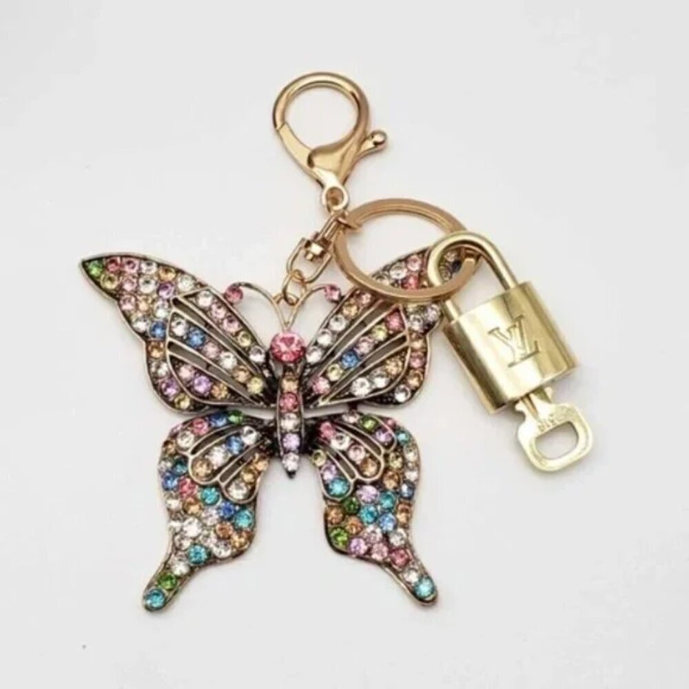 Louis Vuitton Gold Lock 🔒 Authentic LV Key + Unbranded Butterfly Bag Charm - Picture 1 of 7